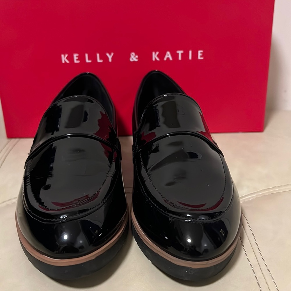 Black patent Oxford slip ons.